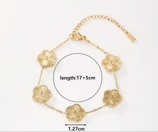 Ατσάλινο βραχιόλι με χρυσά λουλούδια