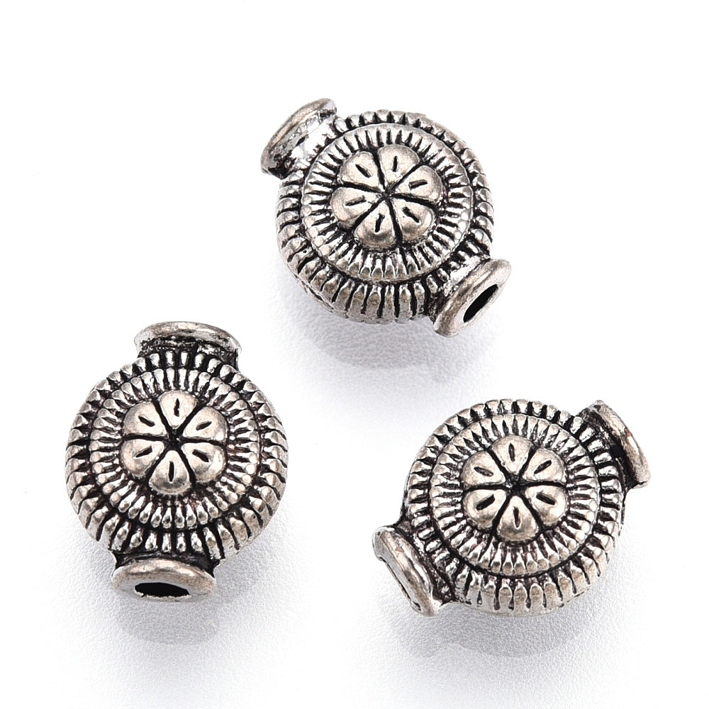 Μεταλλική χάντρα με λουλούδι 9mm