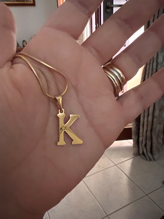 Ατσάλινο χρυσό μονόγραμμα