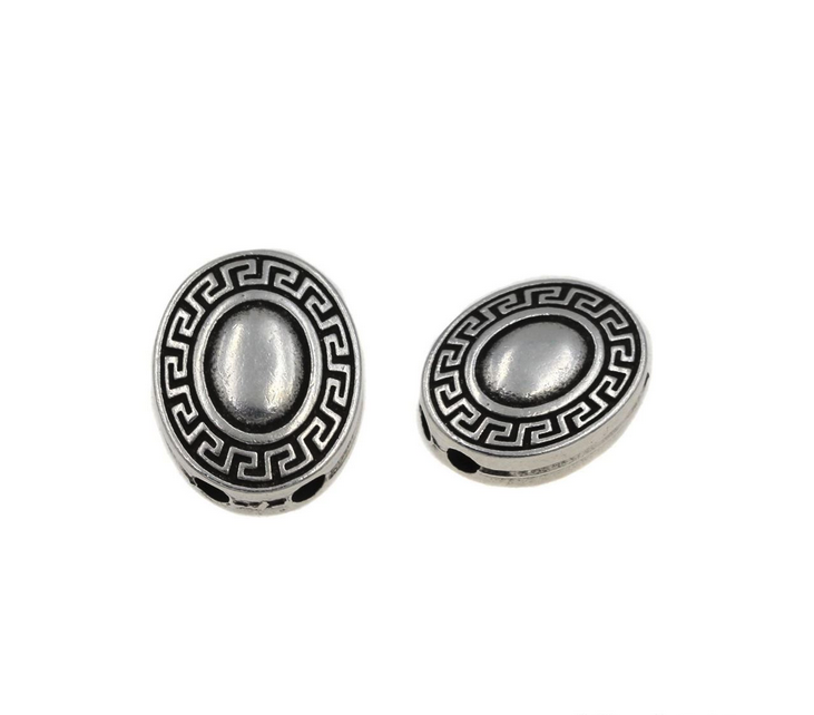 Μεταλλικός θυρεός οβάλ με μαίανδρο 18mm