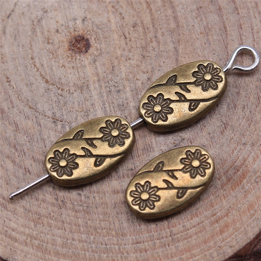 Μεταλλική χάντρα με λουλούδια 10mm